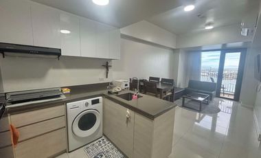 FOR RENT - FURNISHED 1BEDROOM WITH SEAVIEW BALCONY IN MANDANI BAY, MANDAUE CEBU. FRONT SEAVIEW UNIT.