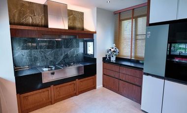 This quiet luxury pool villa in Summit Green Valley for sale