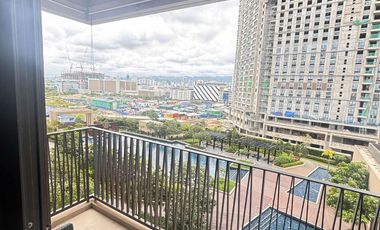 FOR RENT - AFFORDABLE 2BR WITH POOL VIEW BALCONY IN MANDANI BAY, MANDAUE CEBU. FURNISHED.