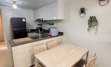 FOR RENT - AFFORDABLE 2BR WITH POOL VIEW BALCONY IN MANDANI BAY, MANDAUE CEBU. FURNISHED.
