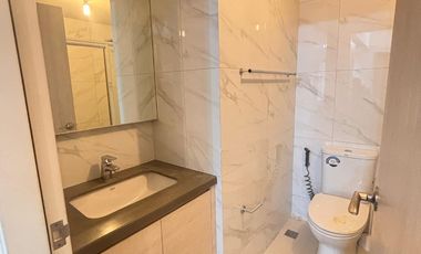 FOR RENT - AFFORDABLE 2BR WITH POOL VIEW BALCONY IN MANDANI BAY, MANDAUE CEBU. FURNISHED.