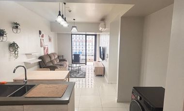 FOR RENT - AFFORDABLE 2BR WITH POOL VIEW BALCONY IN MANDANI BAY, MANDAUE CEBU. FURNISHED.