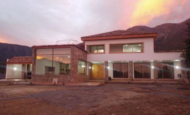 PARCELA CON CASA VISTA HERMOSA EN CONDOMINIO LA AURORA