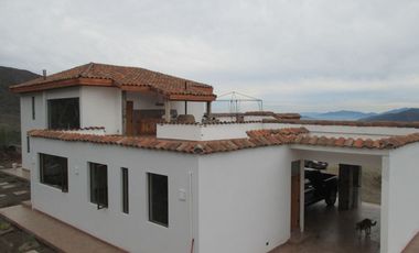 PARCELA CON CASA VISTA HERMOSA EN CONDOMINIO LA AURORA