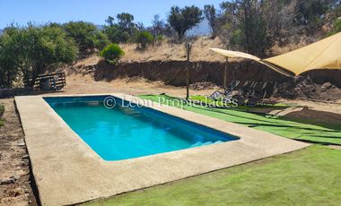 Leon Propiedades vende parcela de 2 Ha. con 2 casas en fundo Alhué, Curacaví.