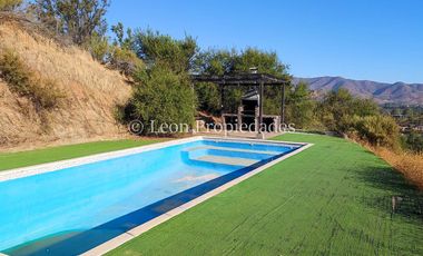 Leon Propiedades vende parcela en condominio, sector Los Naranjos, Curacaví.