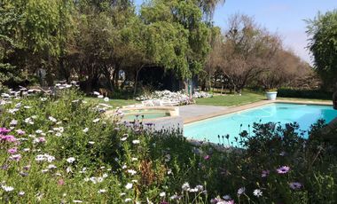 HERMOSA PARCELA CON CASA EN CONDOMINIO LA AURORA