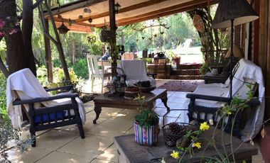 HERMOSA PARCELA CON CASA EN CONDOMINIO LA AURORA