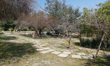 HERMOSA PARCELA CON CASA EN CONDOMINIO LA AURORA