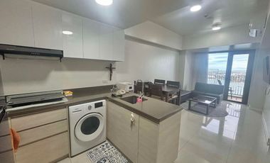 FOR SALE - 1BR FRONT SEAVIEW UNIT WITH BALCONY IN MANDANI BAY, MANDAUE CEBU. READY FOR OCCUPANCY. FURNISHED UNIT.