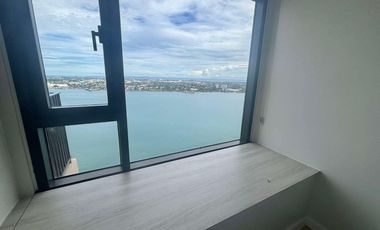 FOR SALE - 1BR FRONT SEAVIEW UNIT WITH BALCONY IN MANDANI BAY, MANDAUE CEBU. READY FOR OCCUPANCY. FURNISHED UNIT.