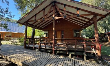 Complejo de cabañas turístico orilla pavimento camino termas de Chillan