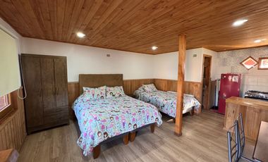 Complejo de cabañas turístico orilla pavimento camino termas de Chillan