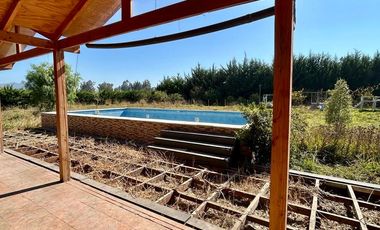 Parcela en Melipilla! con 2 Casas de 357 m2 más terreno de 5.000 m2. Condominio Las Flores.