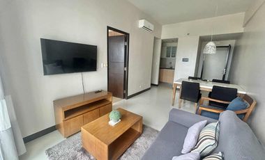 FOR RENT - POLISHED 1BR WITH BALCONY IN MACTAN NEWTOWN CONDO, LAPU-LAPU CITY, CEBU.