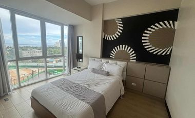 FOR RENT - POLISHED 1BR WITH BALCONY IN MACTAN NEWTOWN CONDO, LAPU-LAPU CITY, CEBU.
