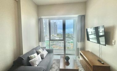 FOR RENT - POLISHED 1BR WITH BALCONY IN MACTAN NEWTOWN CONDO, LAPU-LAPU CITY, CEBU.