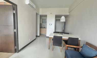 FOR RENT - POLISHED 1BR WITH BALCONY IN MACTAN NEWTOWN CONDO, LAPU-LAPU CITY, CEBU.