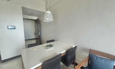 FOR RENT - POLISHED 1BR WITH BALCONY IN MACTAN NEWTOWN CONDO, LAPU-LAPU CITY, CEBU.