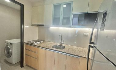 FOR RENT - POLISHED 1BR WITH BALCONY IN MACTAN NEWTOWN CONDO, LAPU-LAPU CITY, CEBU.