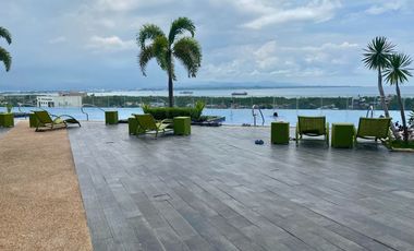 FOR RENT - POLISHED 1BR WITH BALCONY IN MACTAN NEWTOWN CONDO, LAPU-LAPU CITY, CEBU.