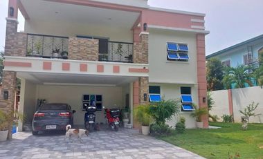 TWO STOREY HOUSE AND LOT FOR SALE IN VALENCIA ID 14980