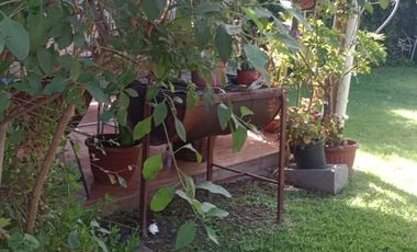 Terreno de 980 mts2 con casa y local comercial EN VENTA - MELIPILLA
