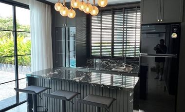 A luxury pool villa fully furnished with smart home system, prime location for sale in Rung Aroon