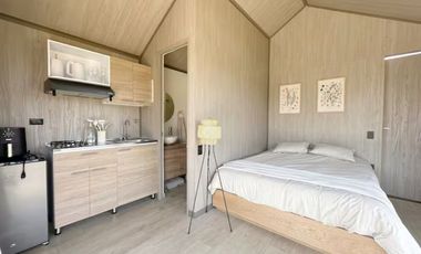 Venta lote con 2 cabañas, (AIrbnb)