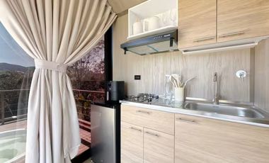 Venta lote con 2 cabañas, (AIrbnb)