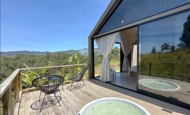 Venta lote con 2 cabañas, (AIrbnb)