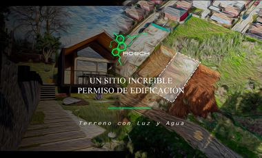 Comodo terreno con agua y luz (cuenta con permiso de edificación)