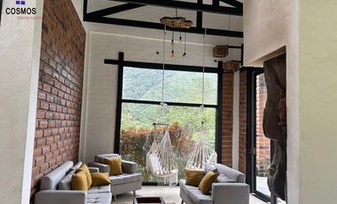 Venta de hostal con terreno en Cotacachi, 5 hectáreas