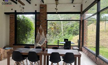 Venta de hostal con terreno en Cotacachi, 5 hectáreas