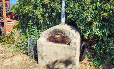 Leon Propiedades vende sitio con casa y un departamento en sector Lo Águila, Curacaví.