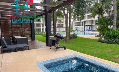 Terraza con jacuzzi y acceso directo al jardín