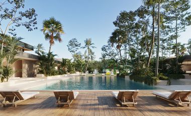 ¡Terreno residencial en Playa del Carmen con amenidades de lujo y entorno natural!