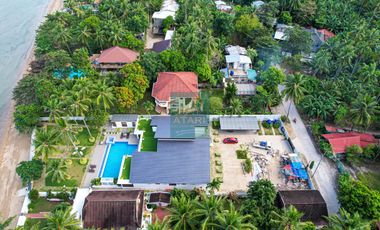 Elegant Beachfront 4BR Home in Carmen with Rooftop Deck & Expansive Garden