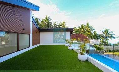 Elegant Beachfront 4BR Home in Carmen with Rooftop Deck & Expansive Garden