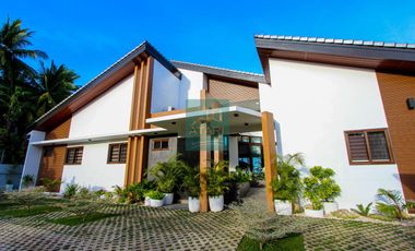 Elegant Beachfront 4BR Home in Carmen with Rooftop Deck & Expansive Garden