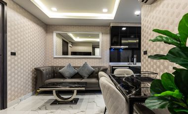 Compact 2 Bedroom, 1 Bathroom Condo with City and Sea View