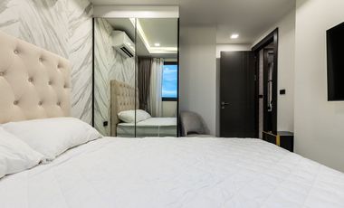 Compact 2 Bedroom, 1 Bathroom Condo with City and Sea View