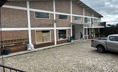 Venta de terreno con casa y fábrica en Atuntaqui, 1977 m2