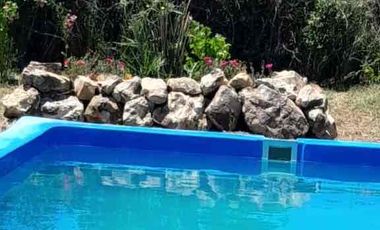 Se vende Parcela con casa en Linares