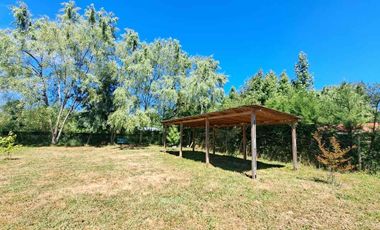 Se vende Parcela con casa en Linares