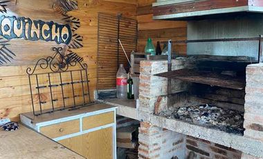 Se vende terreno con casa en Carretones