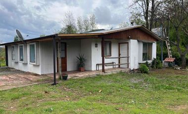 Se vende terreno con casa en Carretones