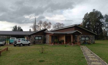 Parcela con casa en condominio en Temuco.