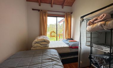 Parcela con dos casa en Condominio Reserva Cheillaco, comuna de Villarrica.