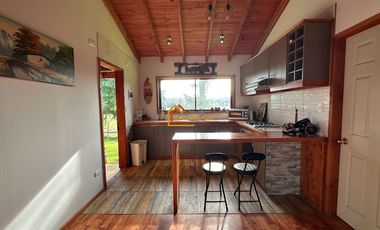 Parcela con dos casa en Condominio Reserva Cheillaco, comuna de Villarrica.